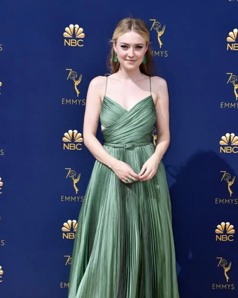 Dakota Fanning speaking at a press conference for a new film