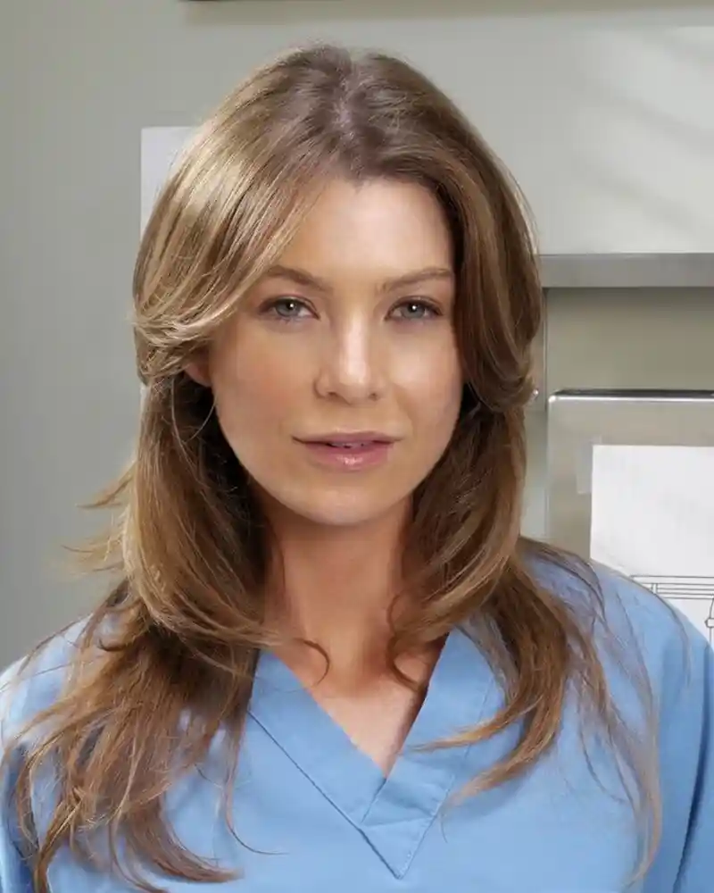 Close-up of Ellen Pompeo with minimal makeup and soft curls
