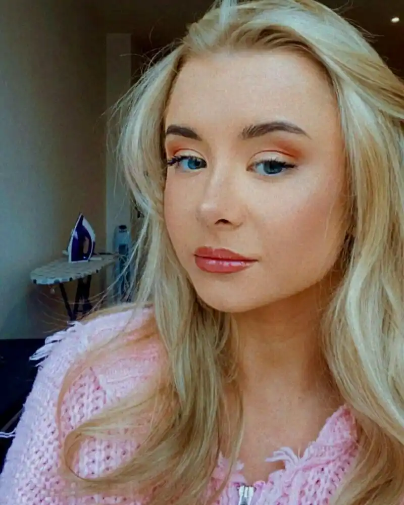 Kerry Ingram portrait close-up with blonde hair and smile