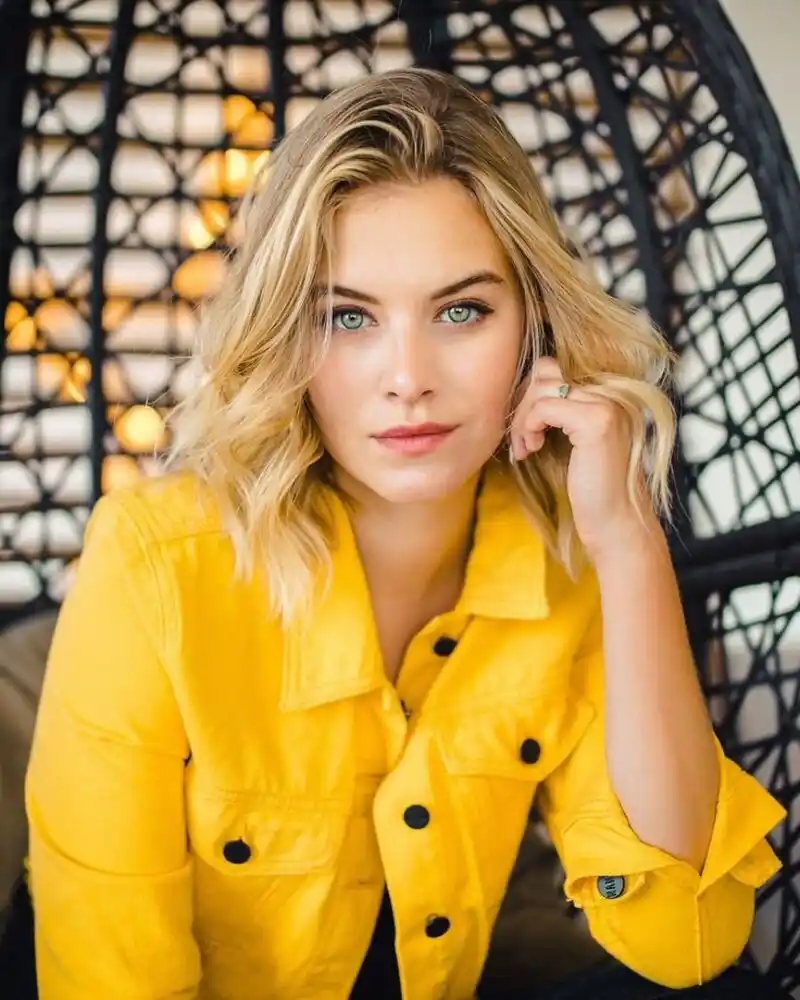 Tiera Skovbye headshot with natural makeup and blonde hair
