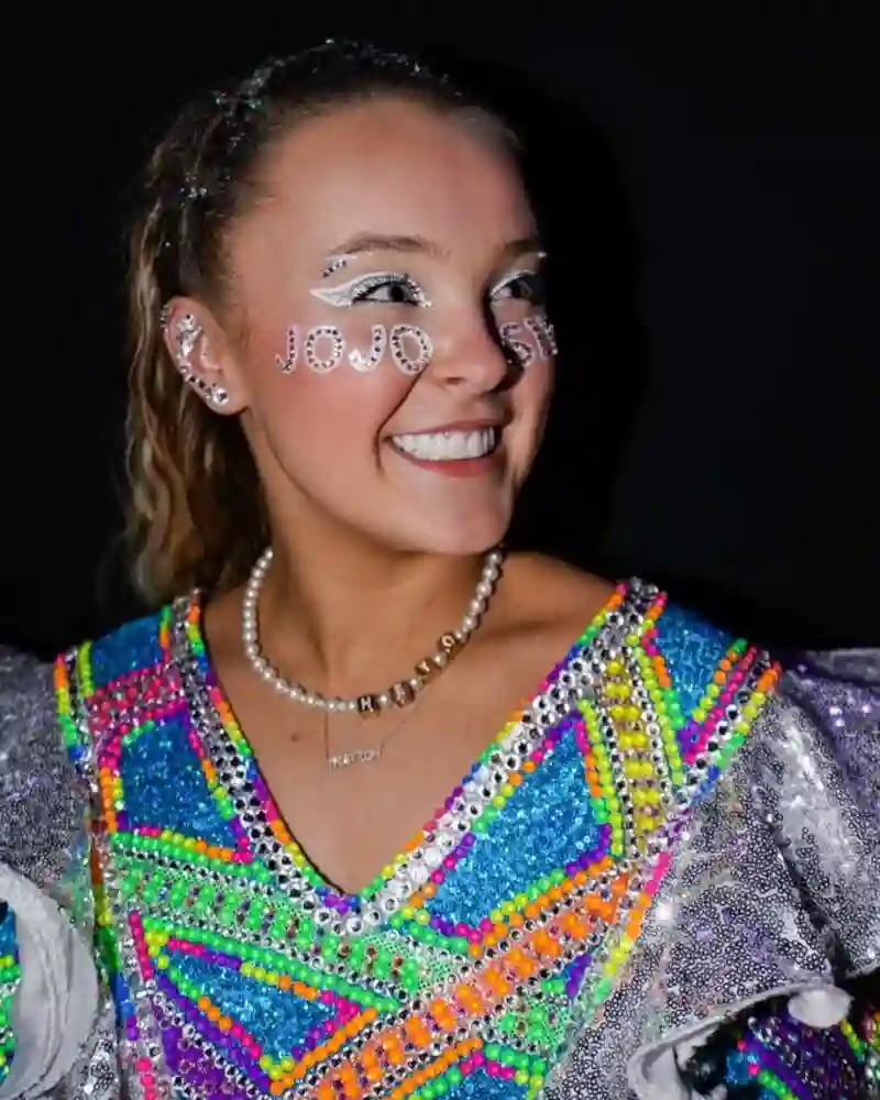 JoJo Siwa smiling in casual fashion look